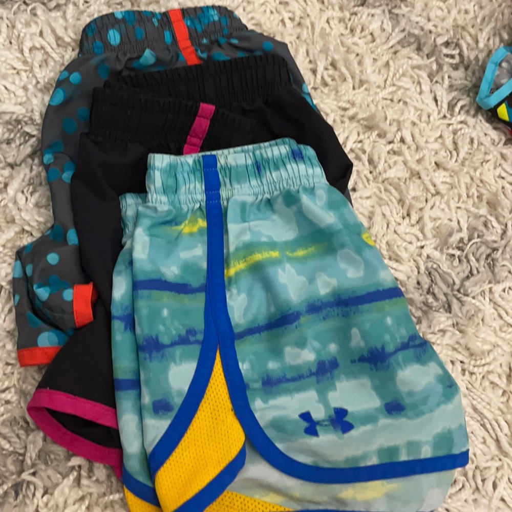3 under armor shorts girls.